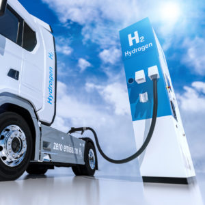 AdobeStock_324407848hydrogen logo on gas stations fuel dispenser. h2 combustion Truck engine for emission free ecofriendly transport. 3d rendering