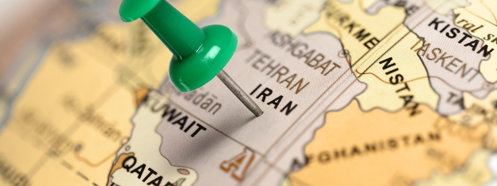 AdobeStock_79753785 Location Iran. Green pin on the map.